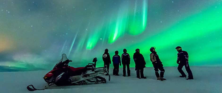 Snowmobile Tours Blaze across the Arctic tundra on mighty machines